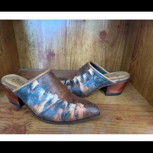 These Icon Mules w/Running Horse Design, signed.